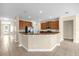 Beautiful kitchen with granite countertops, stainless steel appliances, and ample cabinet space at 14517 Black Lake Preserve St, Winter Garden, FL 34787
