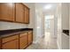 Well-organized pantry with ample cabinet space, offering convenient storage solutions at 14517 Black Lake Preserve St, Winter Garden, FL 34787