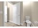 Toilet room with white fixtures and tile flooring at 14517 Black Lake Preserve St, Winter Garden, FL 34787