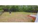 Large, fenced backyard provides ample space for outdoor activities at 1472 6Th Ave, Deland, FL 32724