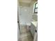 Bathroom features updated vanity and tiled walk-in shower at 1472 6Th Ave, Deland, FL 32724