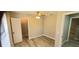 Neutral bedroom with light wood-look floors, a ceiling fan, and a large closet at 1472 6Th Ave, Deland, FL 32724