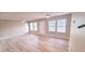 Bright and open living area with multiple windows and neutral paint at 1472 6Th Ave, Deland, FL 32724