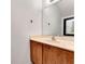 Well-lit bathroom featuring a neutral-toned vanity and a large mirror at 1523 Casa Park Cir, Winter Springs, FL 32708