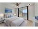 Staged bedroom featuring a queen bed, matching nightstands, and artwork at 1523 Casa Park Cir, Winter Springs, FL 32708