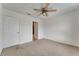 Spacious bedroom with ensuite bath has a ceiling fan at 1523 Casa Park Cir, Winter Springs, FL 32708