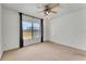 Bedroom features a window, closet, and neutral colored carpet at 1523 Casa Park Cir, Winter Springs, FL 32708