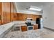 Well-equipped kitchen with stainless steel appliances, laminate countertops, and ample storage space at 1523 Casa Park Cir, Winter Springs, FL 32708
