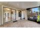 Private screened-in patio with sliding glass doors and brick flooring at 1523 Casa Park Cir, Winter Springs, FL 32708