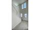 Bright entryway with a staircase, tiled floor, high ceilings, and plenty of natural light at 1908 Diamond Head Cir, Lake Hamilton, FL 33851