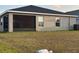 Screened in back porch and yard at 2000 Golden Beak Dr, Eagle Lake, FL 33839