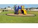 Community playground with colorful equipment at 2000 Golden Beak Dr, Eagle Lake, FL 33839