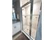 Walk-in shower featuring glass door, and tile surround at 2000 Golden Beak Dr, Eagle Lake, FL 33839