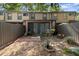 Backyard featuring brick patio, new fence, and landscaping around the townhome at 2808 Revere Ct, Casselberry, FL 32707