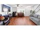Bright living room with stylish furniture and hardwood floors at 2808 Revere Ct, Casselberry, FL 32707