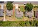 Aerial view of the property with a neatly maintained lawn and landscaping surrounded by a red boundary line at 2924 Jebidiah Loop, St Cloud, FL 34772