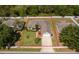 Aerial view of the property showcasing its layout, landscaping, and proximity to neighboring homes at 2924 Jebidiah Loop, St Cloud, FL 34772