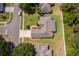 Aerial view of the property featuring a backyard, nearby trees, and surrounding neighborhood at 2924 Jebidiah Loop, St Cloud, FL 34772