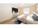 Serene bedroom with plush carpeting, TV, and a calming color palette at 2924 Jebidiah Loop, St Cloud, FL 34772