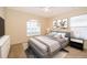 Bedroom with large window for natural light and soft neutral décor at 2924 Jebidiah Loop, St Cloud, FL 34772