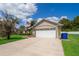 Charming single-Gathering home with a well-manicured lawn and a two-car garage at 2924 Jebidiah Loop, St Cloud, FL 34772