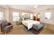 Comfortable main bedroom with neutral tones and a ceiling fan at 2924 Jebidiah Loop, St Cloud, FL 34772