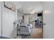 This bedroom boasts carpet floors, a ceiling fan, and a TV above a desk at 3001 Little Cypress Cv, Winter Park, FL 32792