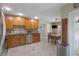 Well-equipped kitchen with stainless steel appliances and an adjacent dining area at 3001 Little Cypress Cv, Winter Park, FL 32792