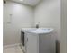 Practical laundry room featuring a washer and dryer, with tiled floors at 3001 Little Cypress Cv, Winter Park, FL 32792