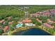 Beautiful aerial view of the community and large shimmering lake at 3064 Yellow Lantana Ln, Kissimmee, FL 34747
