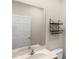 A bathroom featuring a vanity and a large mirror at 3064 Yellow Lantana Ln, Kissimmee, FL 34747