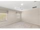 Bright bedroom with neutral walls, carpet flooring, a ceiling fan, and window with blinds at 3064 Yellow Lantana Ln, Kissimmee, FL 34747