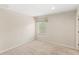 Bright bedroom with neutral walls, carpet flooring, and a window with blind at 3064 Yellow Lantana Ln, Kissimmee, FL 34747