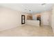 Open-concept kitchen featuring tile floors, and black appliances at 3064 Yellow Lantana Ln, Kissimmee, FL 34747