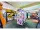 Well-equipped arcade with diverse games, including claw machines and simulators, offering entertainment at 3118 Magic Kingdom Ct, Kissimmee, FL 34746