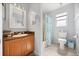 Clean bathroom featuring a vanity with storage and a shower-tub combination at 3118 Magic Kingdom Ct, Kissimmee, FL 34746