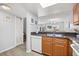 Functional kitchen with stainless steel sink and plenty of natural light at 3118 Magic Kingdom Ct, Kissimmee, FL 34746