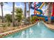 Scenic lazy river with tropical landscaping providing a relaxing and enjoyable ride at 3118 Magic Kingdom Ct, Kissimmee, FL 34746