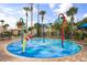 Vibrant splash pad with colorful water features and playful design for entertainment at 3118 Magic Kingdom Ct, Kissimmee, FL 34746