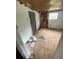 Shows the bedroom with a door and window, and the ceiling and walls in need of repair at 31647 Mount Plymouth Loop, Sorrento, FL 32776