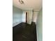 This is a bedroom with green walls and views of doors and a closet at 31647 Mount Plymouth Loop, Sorrento, FL 32776