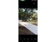 View of street from driveway at 31647 Mount Plymouth Loop, Sorrento, FL 32776