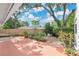 Charming backyard featuring a seating area, lush landscaping, and a privacy fence for outdoor enjoyment at 3332 Stonewood Ct, Orlando, FL 32806
