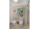 Cozy bathroom features a bidet, toilet, shower, and window with bright, natural light at 3332 Stonewood Ct, Orlando, FL 32806