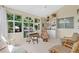 Bright sun room with floor-to-ceiling windows, a ceiling fan, and lots of natural light at 3332 Stonewood Ct, Orlando, FL 32806