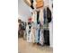 Large walk-in closet with built-in shelving and hanging racks at 3332 Stonewood Ct, Orlando, FL 32806