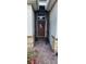 Inviting front entrance with a decorative wreath and stone accents at 3998 Bedford Ave, Winter Haven, FL 33884