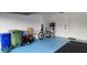 Spacious garage with a bike, generator, water heater, and ample storage space at 3998 Bedford Ave, Winter Haven, FL 33884