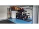 Spacious garage with epoxy floor, room for a golf cart and storage, perfect for organization at 3998 Bedford Ave, Winter Haven, FL 33884
