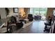 Comfortable living room with a view to the outdoor lanai and water at 3998 Bedford Ave, Winter Haven, FL 33884